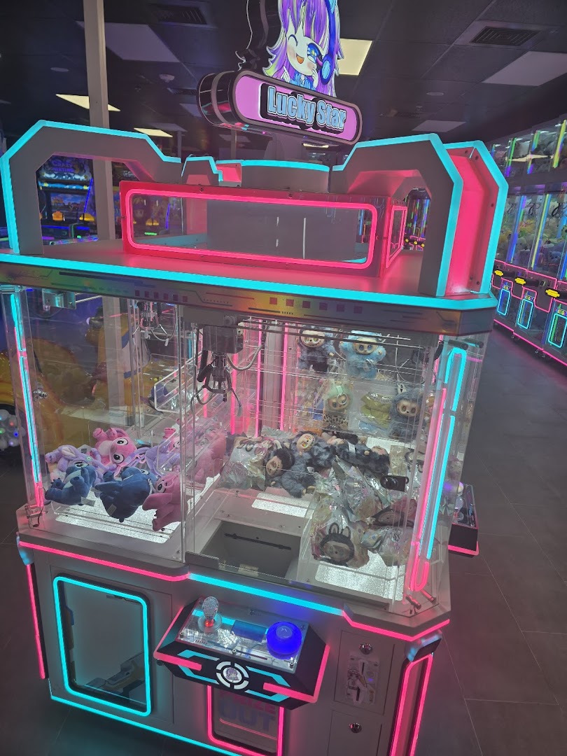 Lucky Star neon claw machine full of plushies
